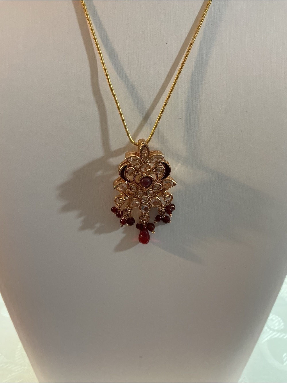 Kundan Rhinestone And Ruby Red Bead Drops Gold Tone Pendant Necklace